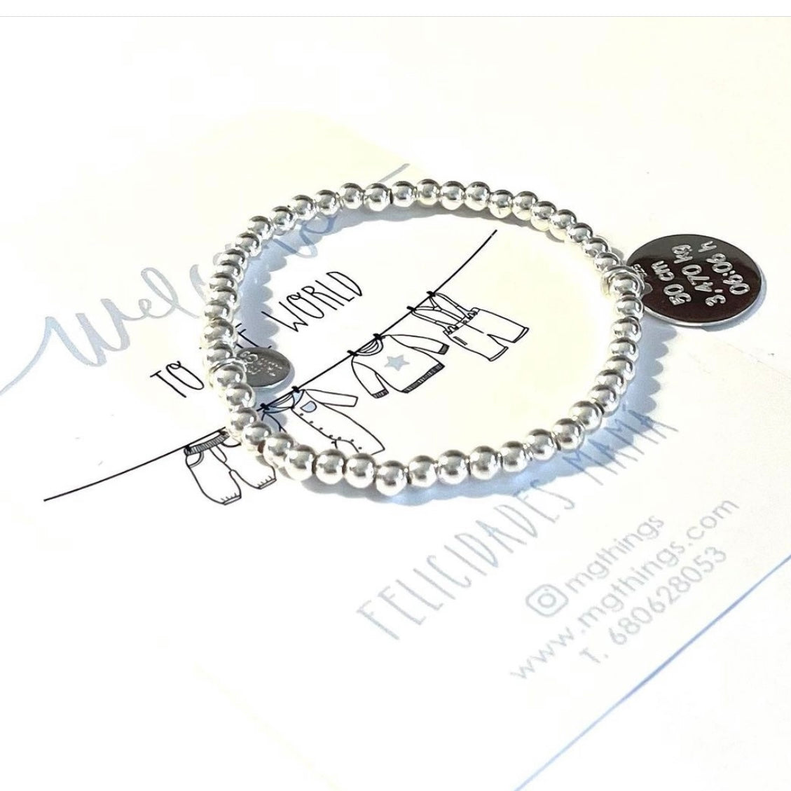 Pulsera elástica  personalizada con bolitas de plata y medalla 17mm