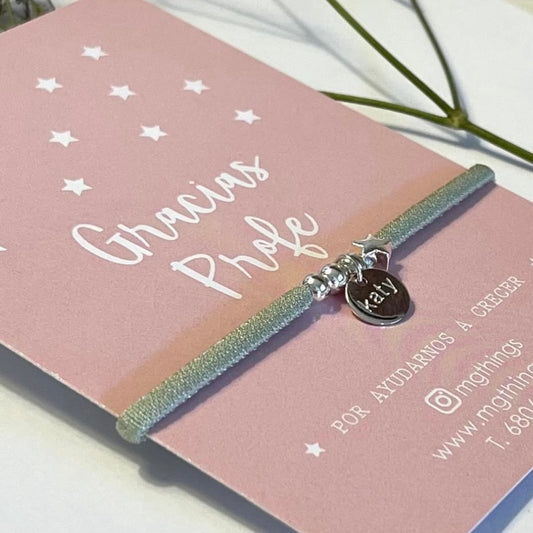 Pulsera elástica con medalla y estrella