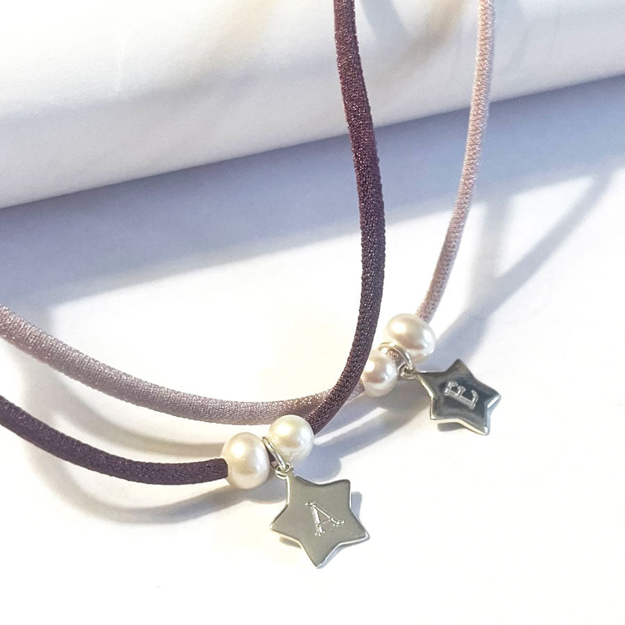 Collar personalizado con estrella y perlas.