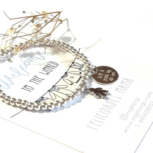 Pulsera elástica personalizada con bolitas de plata + niño/a+medalla.